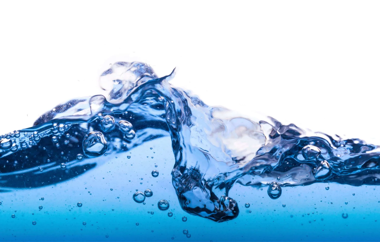 Blue liquid crashing and curling into a wave